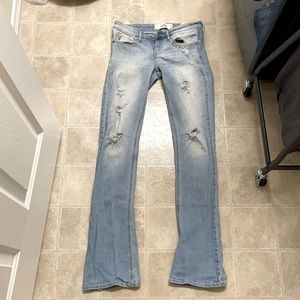 Hollister low rise/ flare ripped jeans. Size 26.